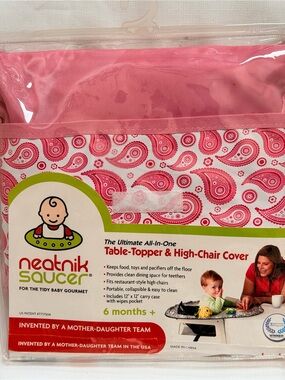 New Neatnik Saucer Table-Topper & High-Chair Cover. a pink /white swirley paisly